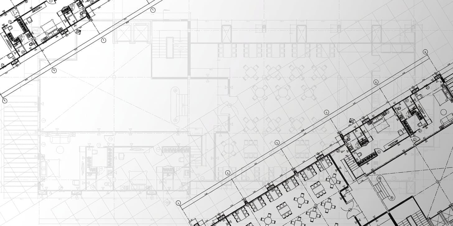 Plan d'architecte en gros plan, symbole du sur-mesure