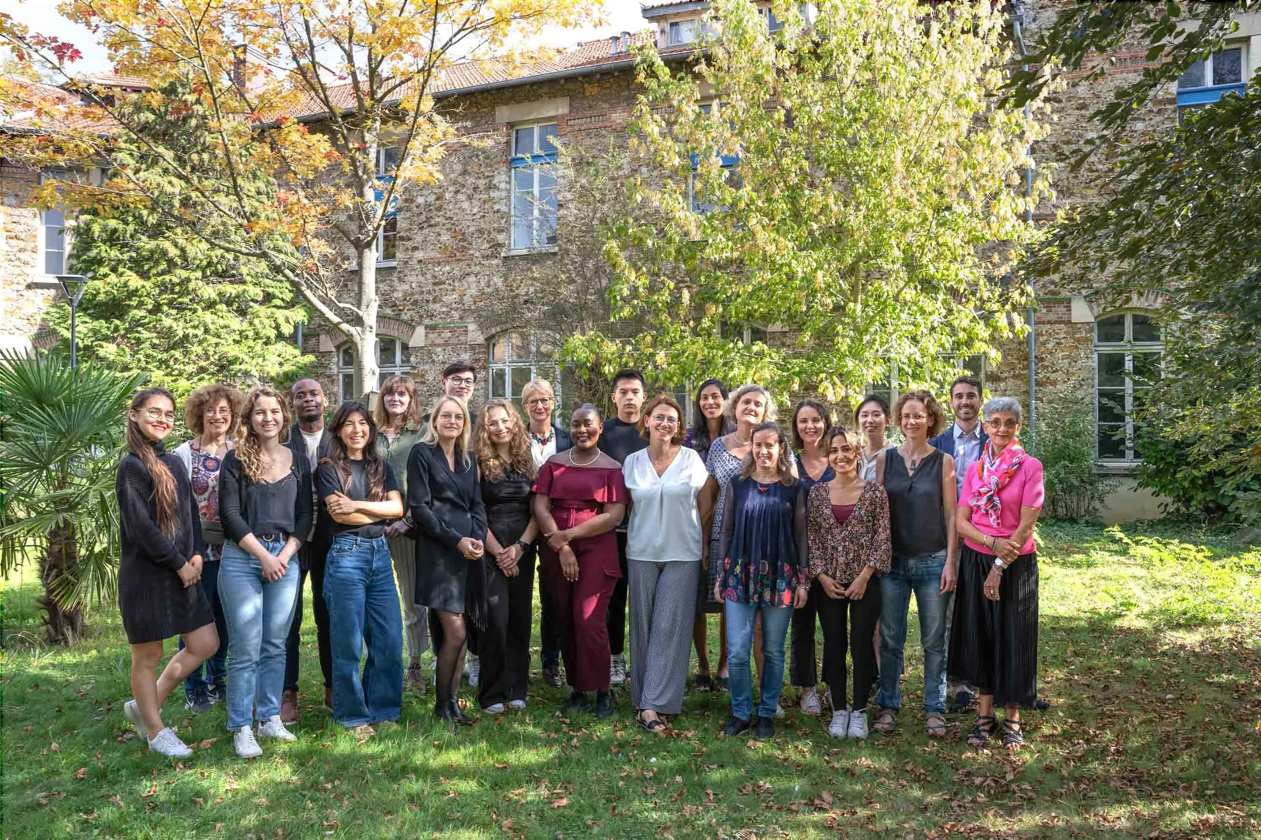 Group photo of a team outdoors